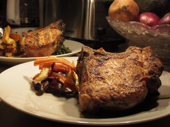 Grilled Double Cut Pork Chops with Roasted Root Vegetables and Braised Mustard Greens